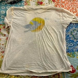 White women’s shirt.